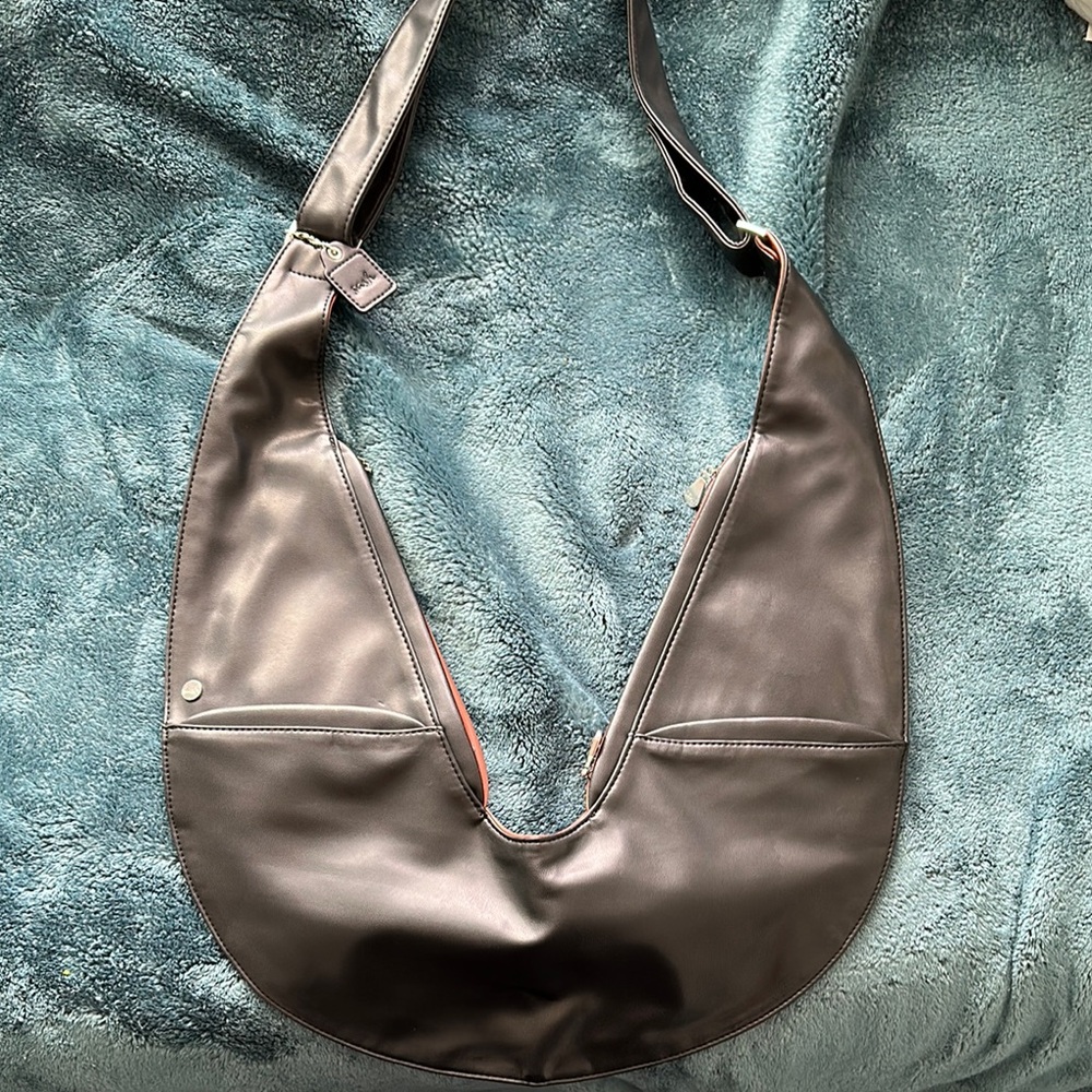Crossbody sash bag reversible